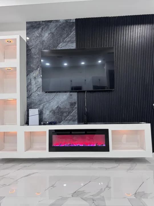Built-in TV wall with linear fireplace